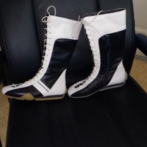 From Anita's Closet DKNY 12 inch high leather black and white boots